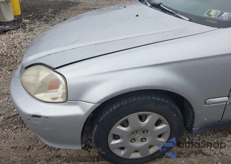 1999 Honda Civic Value Package z USA, uszkodzony, nr VIN 2HGEJ6613XH584231